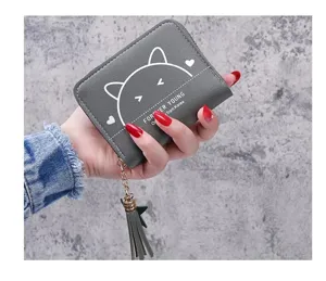 Grey short wallet detail showing cute cat print, zipper closure and stylish tassel pendant.