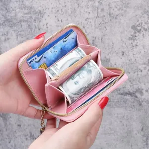 Pink short zipper wallet for women, cute coin purse with multiple card slots and cash compartments.