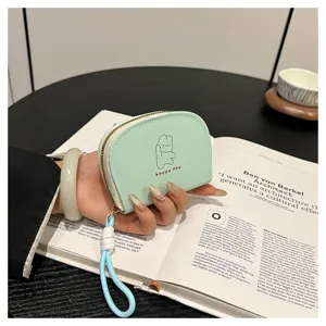 Cute pastel green coin purse with cute rabbit design and lanyard card holder for women