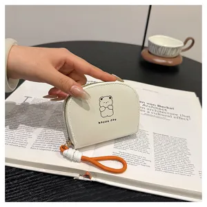 White small coin purse with wrist strap and cute bear design, compact card holder for daily use.