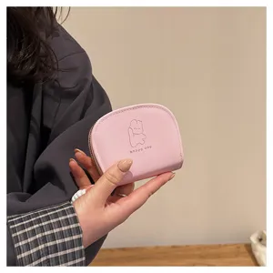 Pink mini coin purse and cute card holder with lovely cartoon embossed design for daily use.