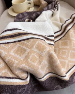 Cozy imitation cashmere winter scarf detail, soft diamond pattern and chic striped edge.