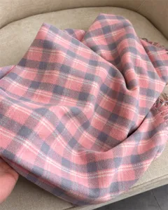 Cozy pink and grey plaid cashmere feel winter scarf with soft tassels for warm daily wear.
