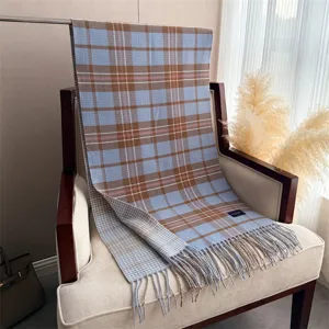 Cosy blue plaid cashmere feel scarf with fringe, perfect warm winter accessory for men and women.