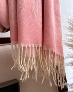Pink cashmere feel fringe scarf detail winter warm fashion cozy stylish soft chic accessory