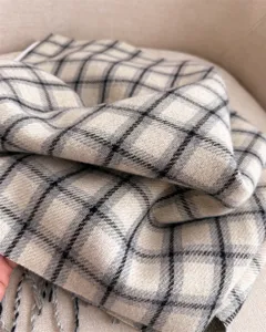Classic plaid imitation cashmere scarf detail showing soft texture and cozy winter style.