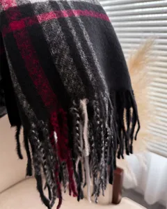 Close-up of cozy plaid fringe scarf, soft cashmere-feel fabric texture, winter warm accessory.