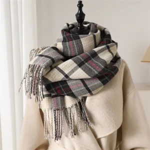 Classic plaid tassel scarf for autumn and winter, warm and soft fashion accessory.
