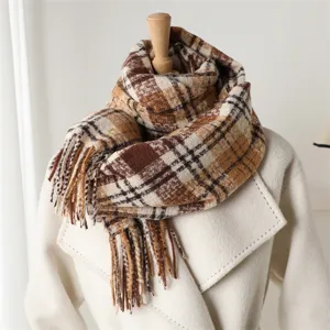 Detail view of a cozy Korean style plaid fringe scarf, soft winter warm unisex neck warmer.