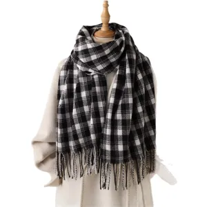 Classic black and white plaid winter cashmere feel scarf with fringe for warm daily commute.