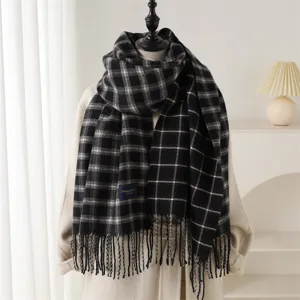 Classic black and white plaid cashmere-feel tassel scarf for warm autumn and winter commuting.