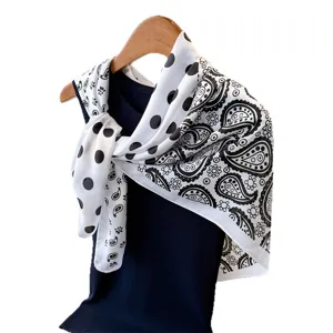 Silk-feel square scarf with black and white paisley and polka dot pattern for women.