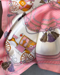 Luxurious pink carriage print silk scarf, elegant square shawl and neck accessory for women.
