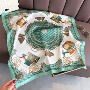 Detailed view of the French court carriage print silk scarf, showcasing gold chains.