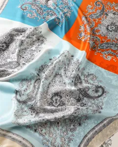 Detailed view of vintage color-block paisley printed silk scarf, soft women's shawl.