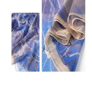 Blue beige floral print soft gauze scarf detail close-up, breathable spring summer shawl.