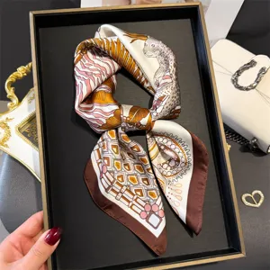 Elegant silk square scarf featuring trendy leopard and geometric prints for women.