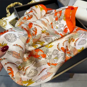 Elegant tropical plant print silk square scarf, high-end versatile fashion accessory.
