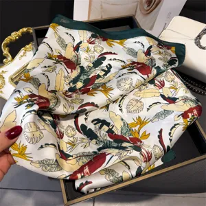 Colorful plant print silk square scarf for women, elegant floral design versatile head wrap.