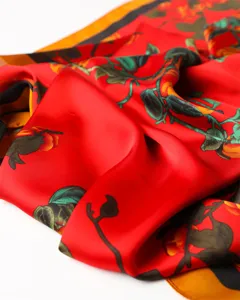 Red silk scarf with vibrant botanical print and black border for women fashion daily wear.