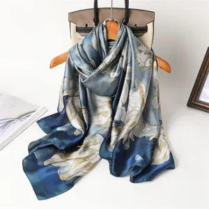 Blue floral imitation silk scarf, elegant long shawl for women, soft fashion accessory.