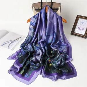 Elegant purple printed silk scarf shawl, lightweight smooth fashion accessory for women.