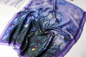 Detailed view of artistic printed silk scarf shawl, lightweight accessory texture fabric close up.