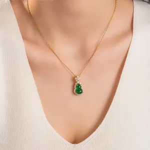 Close-up detail of the green faux chalcedony gourd pendant necklace with gold chain.