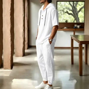 Detail view of men's casual breathable linen hooded short sleeve shirt and long pants set.