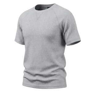 Men's gray waffle knit short sleeve t-shirt, casual crewneck top with raglan sleeves and v-stitch.