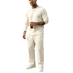 Men casual linen long sleeve crewneck top and pants set for vacation summer beach wear.