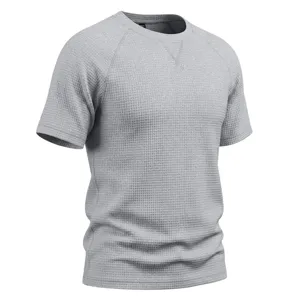 Men's grey waffle-knit short sleeve t-shirt detail texture, casual crewneck raglan top.