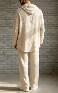 Detail view of men's casual linen hooded shirt and trousers set in beige, loose fit.