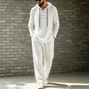 Mens casual linen hooded henley shirt and trousers set for autumn fashion streetwear style.