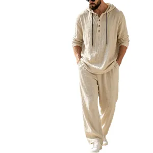 Men's casual solid color linen hoodie and long pants two-piece set in beige, loose fit style.