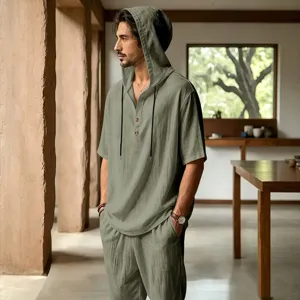 Men's breathable linen hooded short sleeve shirt and pants set for beach vacation.