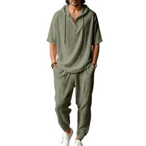 Details of men linen hooded short sleeve shirt and pants set for casual summer beach wear.