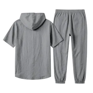 Men casual grey linen hooded short sleeve top and trousers set detail view fashion style.