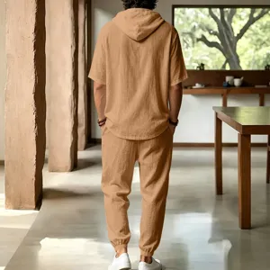 Men's casual linen hooded short sleeve shirt and trousers set for summer beach vacation.