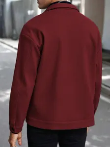 Detail view of the men's winter woolen jacket featuring a classic collar and stylish fit.