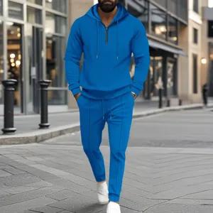 Tuta da uomo casual in tessuto waffle con felpa con cappuccio e pantaloni coordinati.