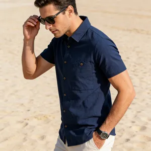 Men casual linen short sleeve shirt detailed view on beach, comfortable summer wear style.