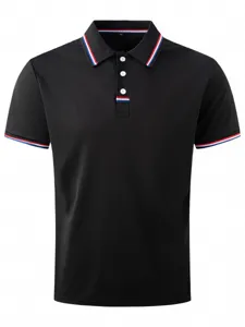 Close-up detail of the classic black polo shirt featuring stylish tricolor striped collar.