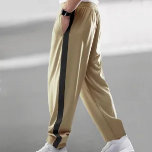 Heren casual sportbroek losse rechte pijp contrasterende zijstreep drukknoppen lange broek.