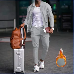 Men grey waffle knit zip up cardigan jacket and trousers tracksuit set for outdoor casual wear.
