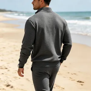 Men's dark grey waffle knit zip up sweatshirt and casual trousers set for autumn and winter outdoor wear.