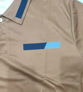 Men's casual brown polo shirt with contrast color collar block and chest stripe design.