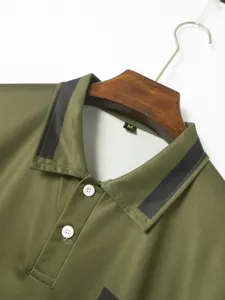 Men's casual polo shirt detail shot, army green lapel design with stylish stripes.