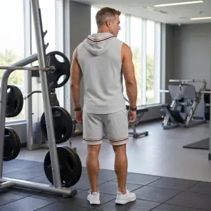 Men's summer waffle knit sleeveless hoodie and shorts gym sportswear set in light grey.