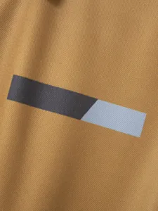 Men's casual polo shirt fabric detail view featuring contrast geometric stripe accent.